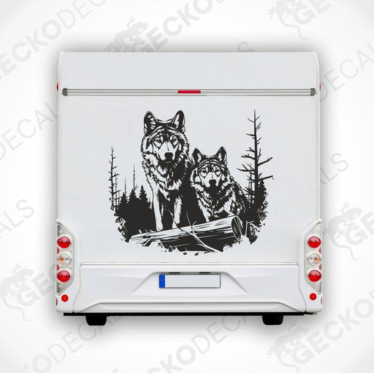 A decal featuring two black and white wolves walking in a forest.