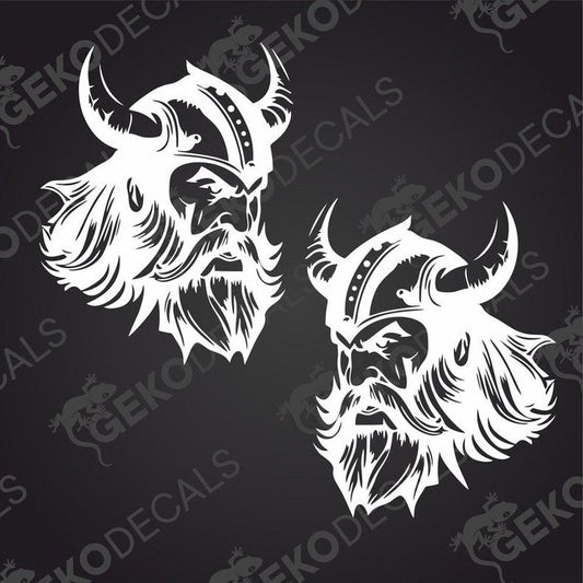 Two black and white decal stickers depicting Viking helmets, suitable for use on vehicles.