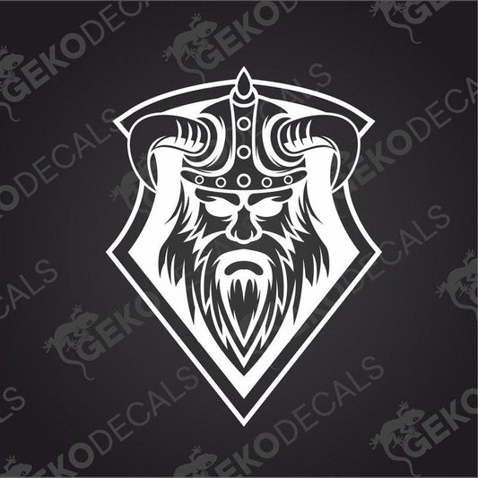 A black and white decal of a Viking helmet with intricate details.