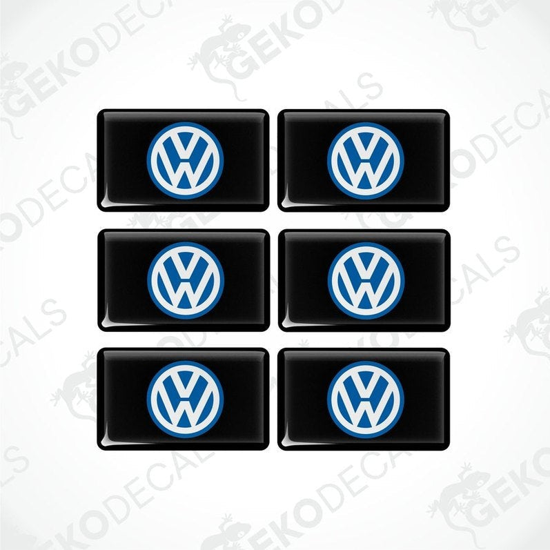 A set of six black and blue vinyl decals with the Volkswagen logo.