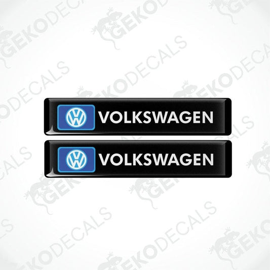 Two black rectangular vinyl decals with VOLKSWAGEN.' text and the Volkswagen logo in blue.
