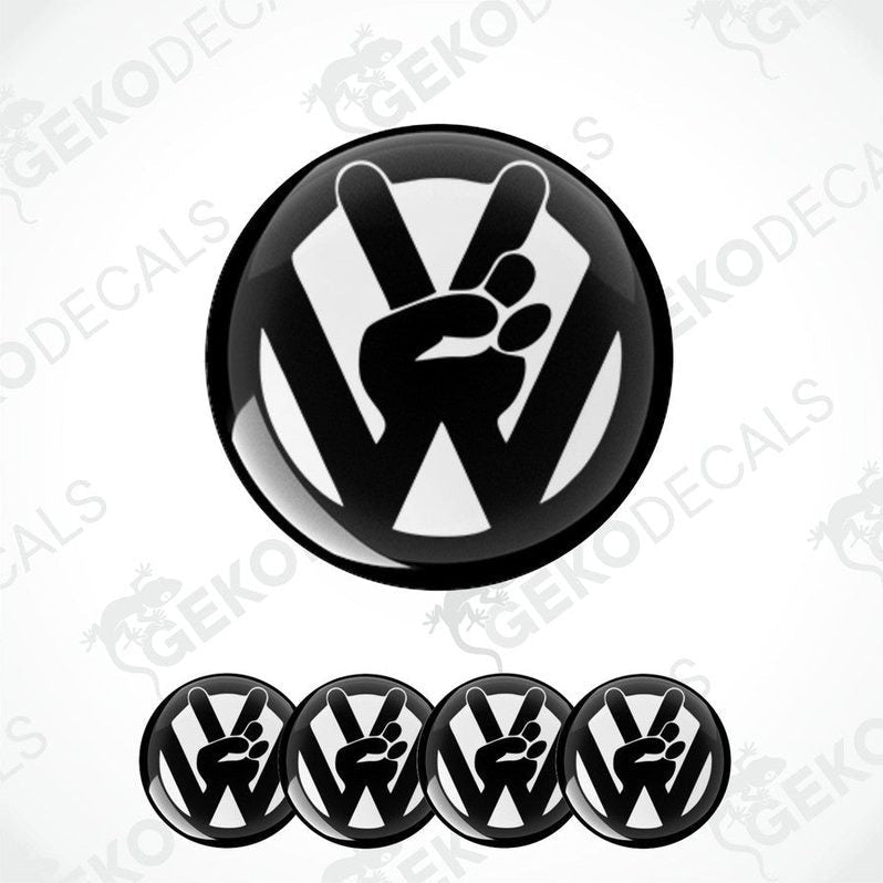 A set of four black vinyl decals with a polyurethane coating featuring the Volkswagen logo.