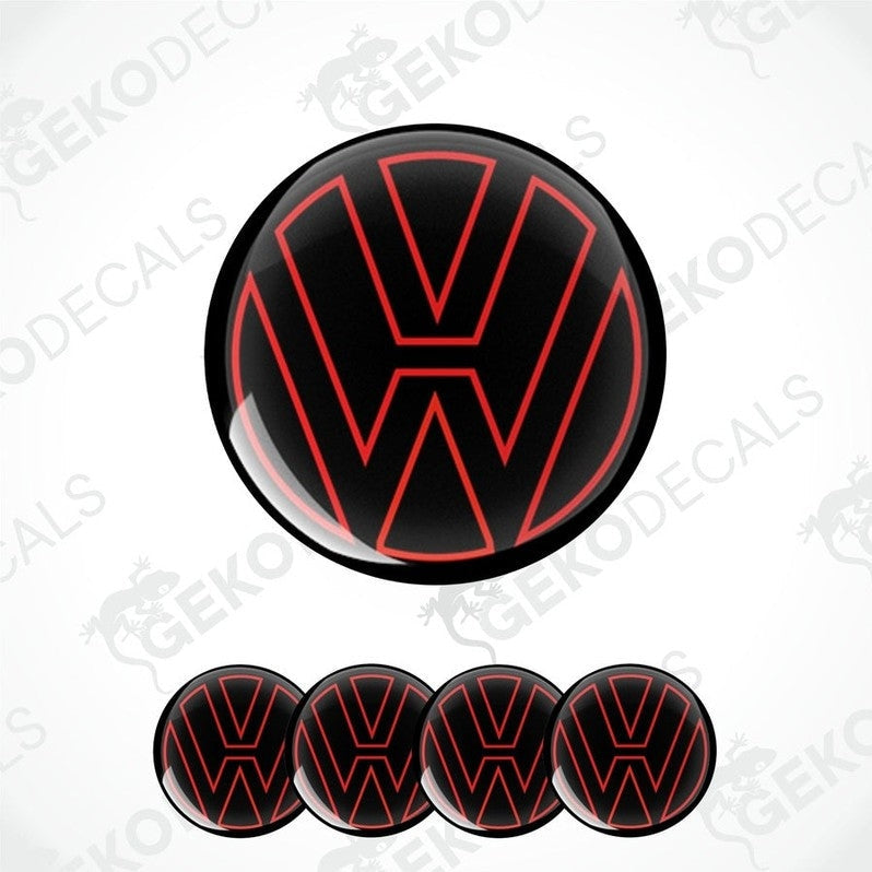 A set of four black vinyl stickers with the word 'VOLKSWAGEN' written in red.