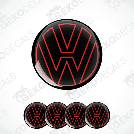 A set of four black vinyl stickers with the word 'VOLKSWAGEN' written in red.