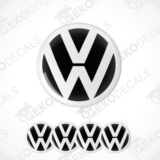 A set of four black and white vinyl stickers with a dome shape and the Volkswagen logo on each.