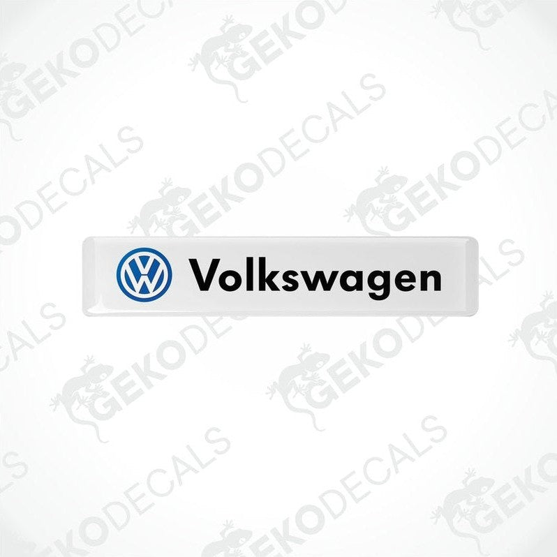 Withe vinyl stickers with the word 'VOLKSWAGEN' written in black and a blue logo of the same name