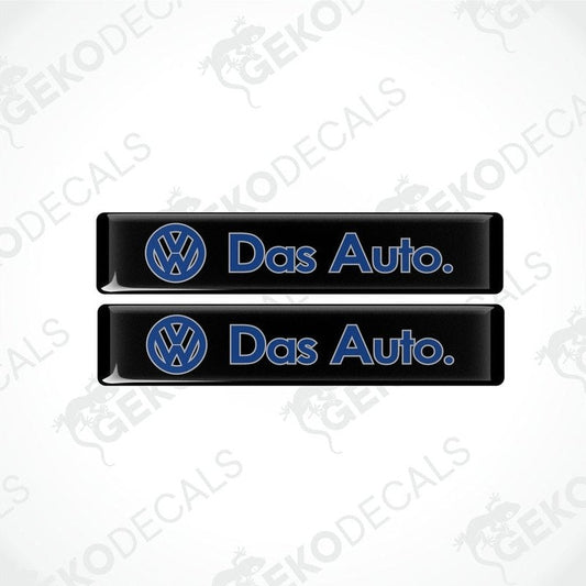 Two black rectangular vinyl decals with 'Das Auto.' text and the Volkswagen logo in blue.