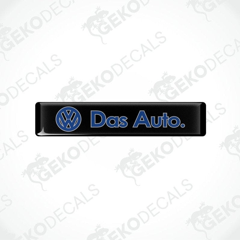 Black rectangular vinyl decals with 'Das Auto.' text and the Volkswagen logo in blue.