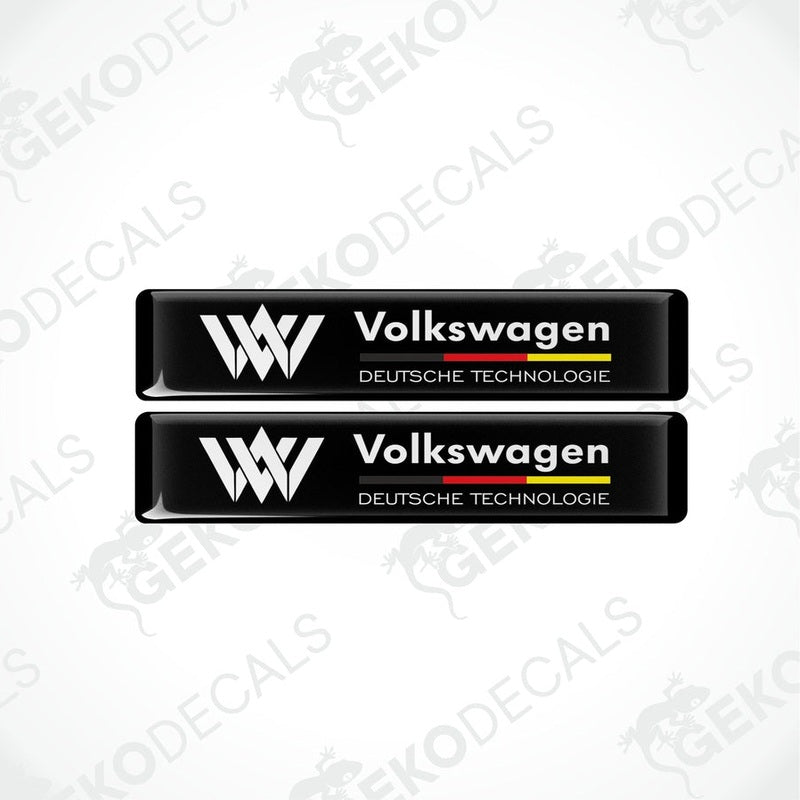 Two black vinyl stickers with the text 'Volkswagen Deutschtechnologie' and the VW logo in white and red colors.