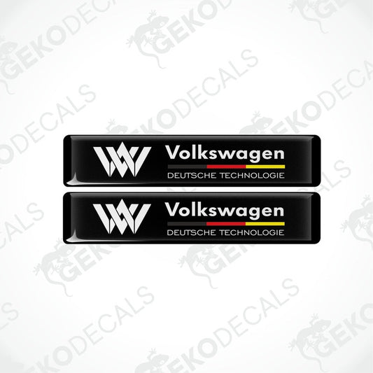 Two black vinyl stickers with the text 'Volkswagen Deutschtechnologie' and the VW logo in white and red colors.