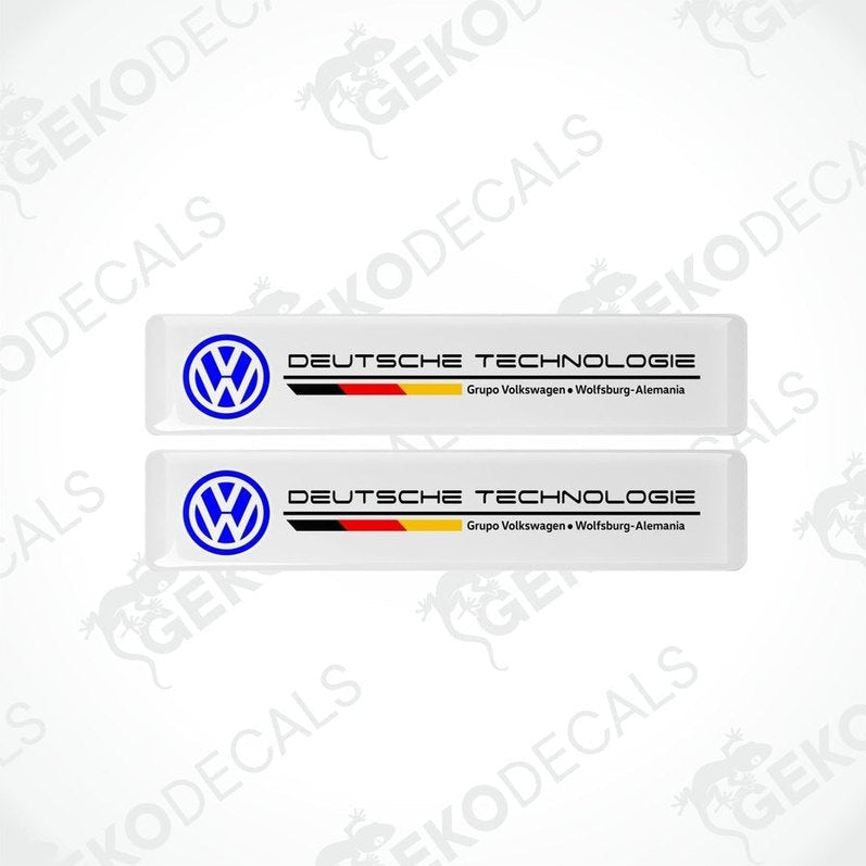 Two withe vinyl stickers with the text 'DEUTSCHE TECHNOLOGIE' and the Volkswagen logo, one with a red and yellow stripe and the other with a blue and yellow stripe.