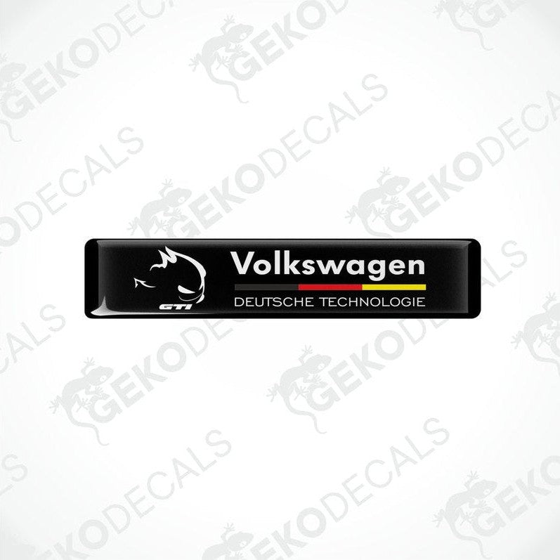 Rectangular black vinyl decals with 'Volkswagen' and 'DEUTSCHES TECHNOLgie' text in white and red-yellow colors