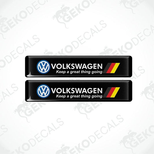 Two black vinyl decals with the Volkswagen logo and the phrase 'Keep a great thing going' printed in white and red.