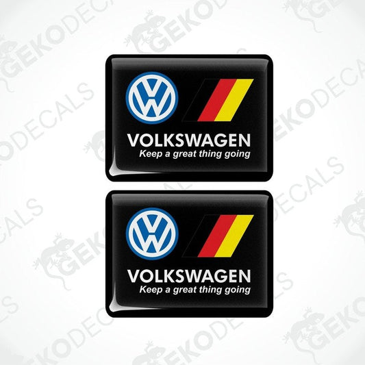 Two black rectangular vinyl decals with the Volkswagen logo and the phrase 'Keep a great thing going' in white lettering, and a yellow and red stripe.