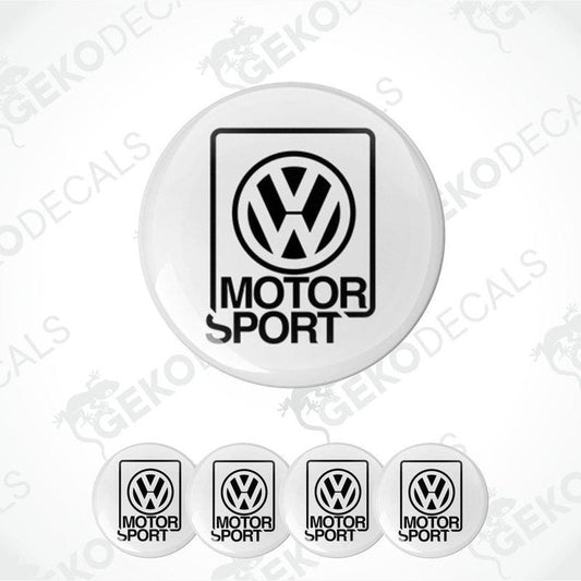A set of four white vinyl stickers with the Volkswagen MotorSport logo in black.