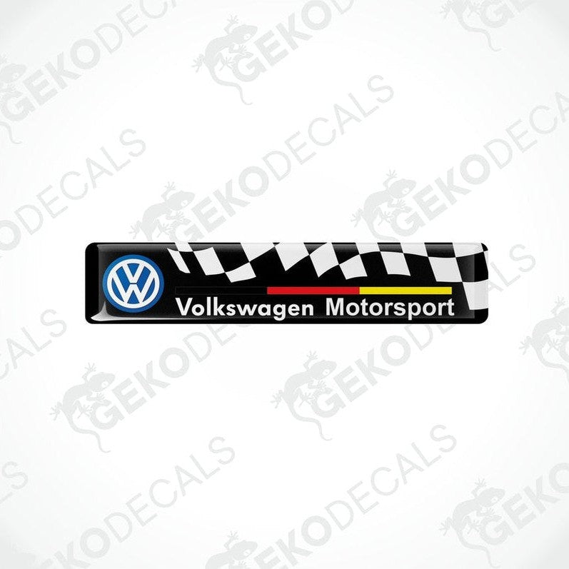  Vinyl stickers with the Volkswagen Motorsport logo, featuring a black and white checkered pattern with red and yellow stripes.
