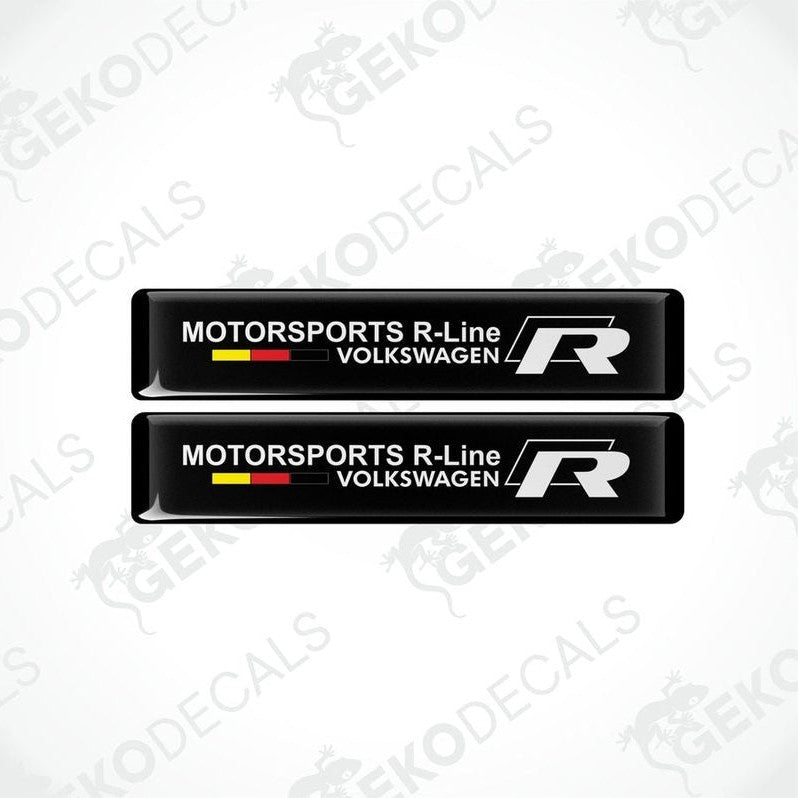 Two black vinyl decals with the text 'MOTORSPORTS R-Line VOLKSWAGEN' and the 'R' logo in white and red.