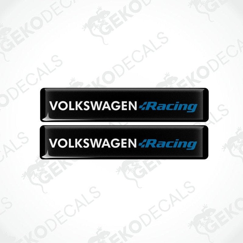 Two black vinyl stickers with the text 'VOLKSWAGEN RACING' in blue and white colors, placed on a white background.