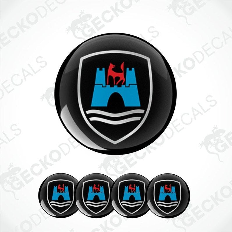 Set of car emblems with a castle and deer design on a white background.