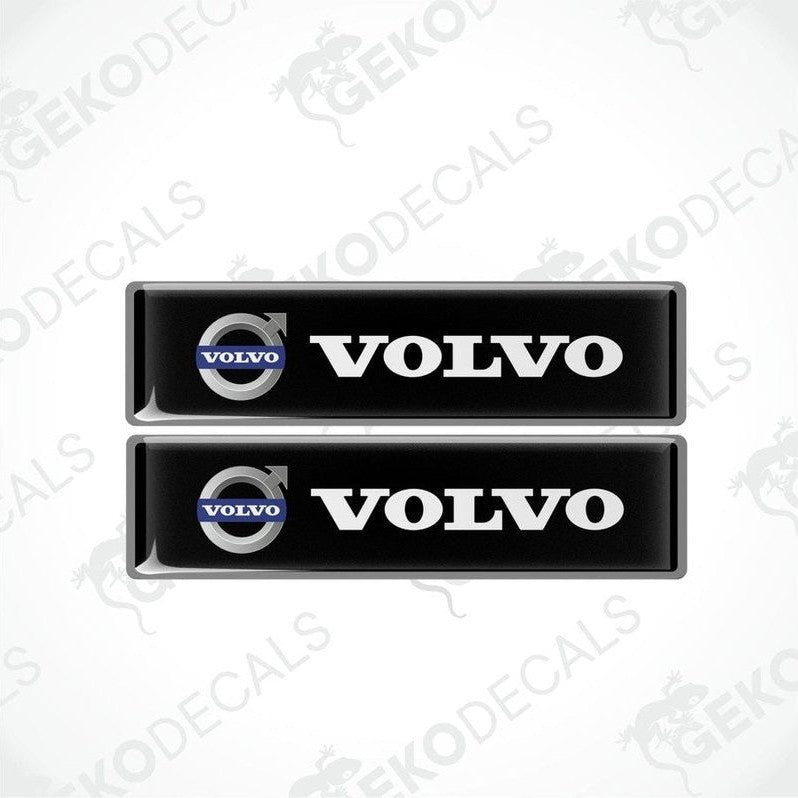 Two rectangular black vinyl decals with the Volvo logo in white.
