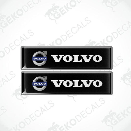 Two rectangular black vinyl decals with the Volvo logo in white.