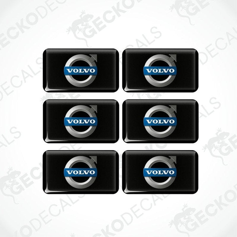 A set of six black vinyl decals with the Volvo logo in white and blue.