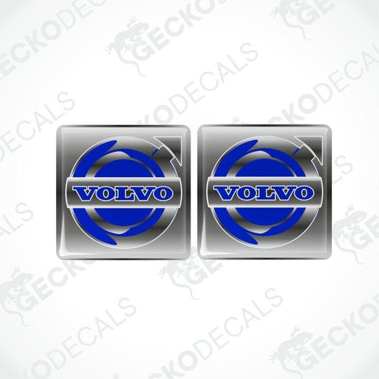 Two blue and white vinyl stickers with a Volvo brand logo.