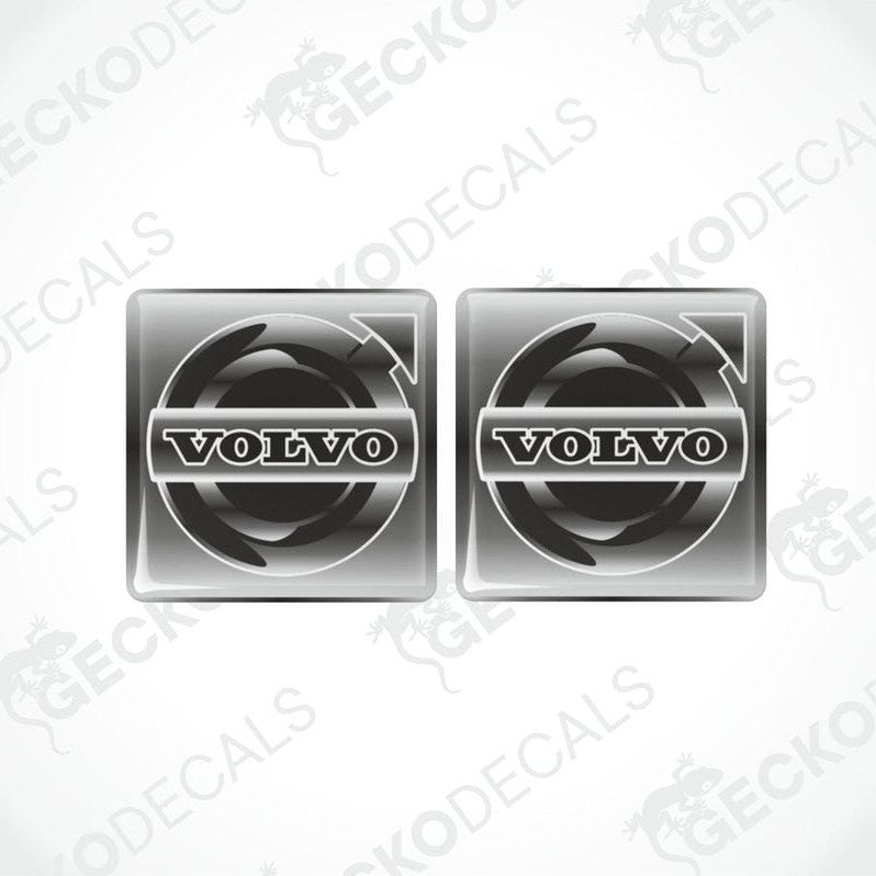 Two grey and white vinyl stickers with a Volvo brand logo.