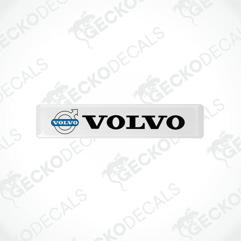 Withe vinyl decals with the black text 'VOLVO' on them, placed on a white background.