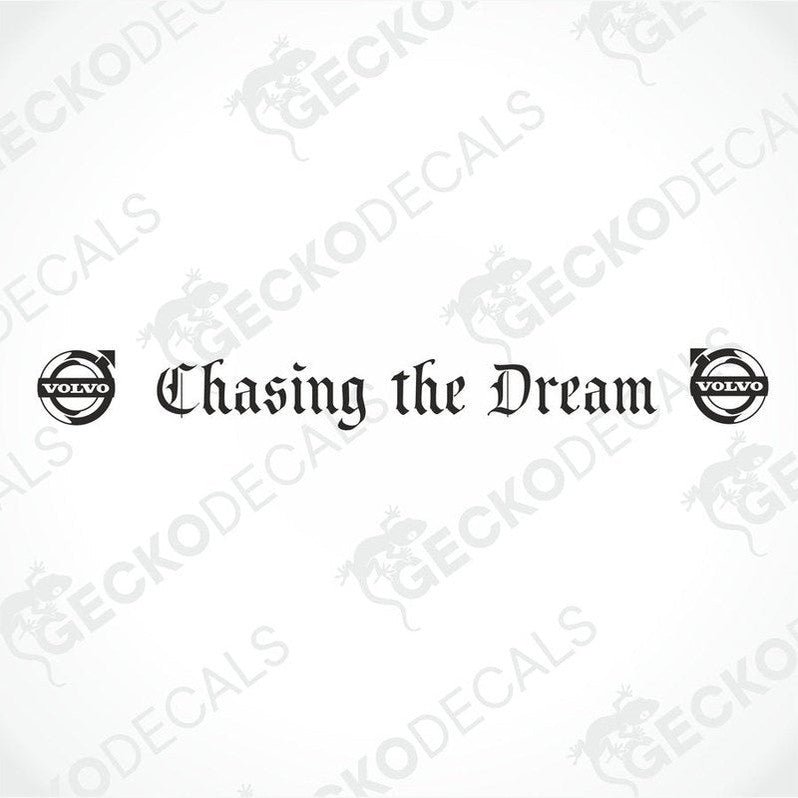 A die cut sticker with the phrase 'Chasing the Dream' displayed on the front windscreen of a gray Volvo truck.