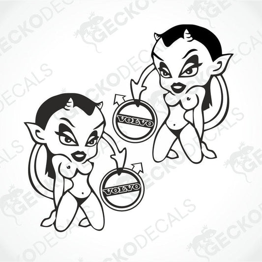 Two black and white stickers of cartoonish devils with the brand name 'VOLVO' on one of the stickers.