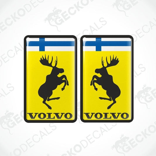 Two rectangular vinyl decals with a polyurethane coating featuring a yellow background, a moose silhouette, and the Volvo FINLAND brand logo.
