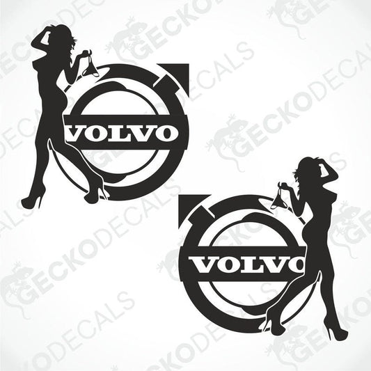 Two black and white stickers, one depicting a silhouette of a female figure with a Volvo logo, and the other showing the Volvo logo alone.