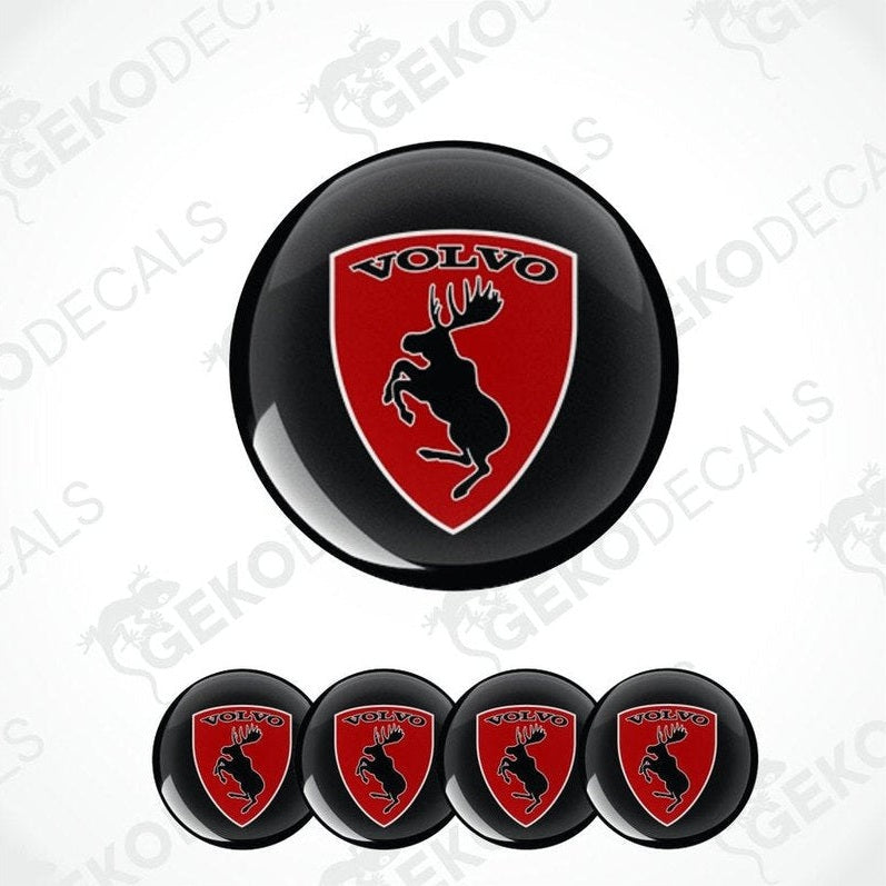 Set of Volvo car emblems with a red shield design on a white background.