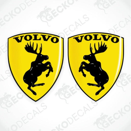 A set of two yellow and black vinyl stickers with the Volvo brand and a moose design.