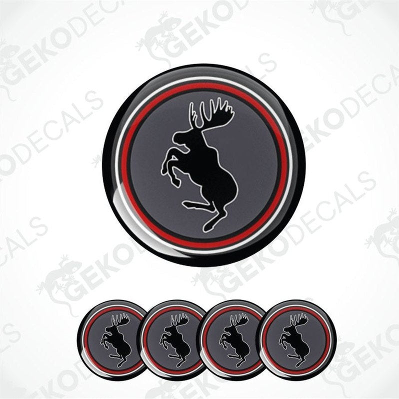 Set of four round decals with a deer logo on a white background