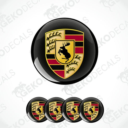 A set of four black, red, and yellow vinyl stickers with a Volvo logo and a moose emblem design.