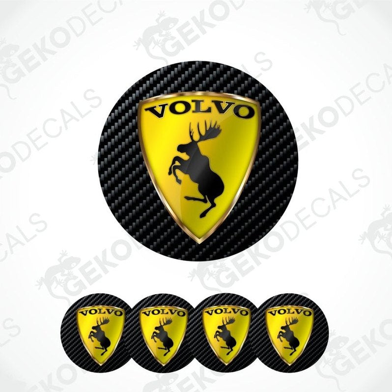 Set of Volvo logos with a yellow emblem on a carbon fiber pattern background