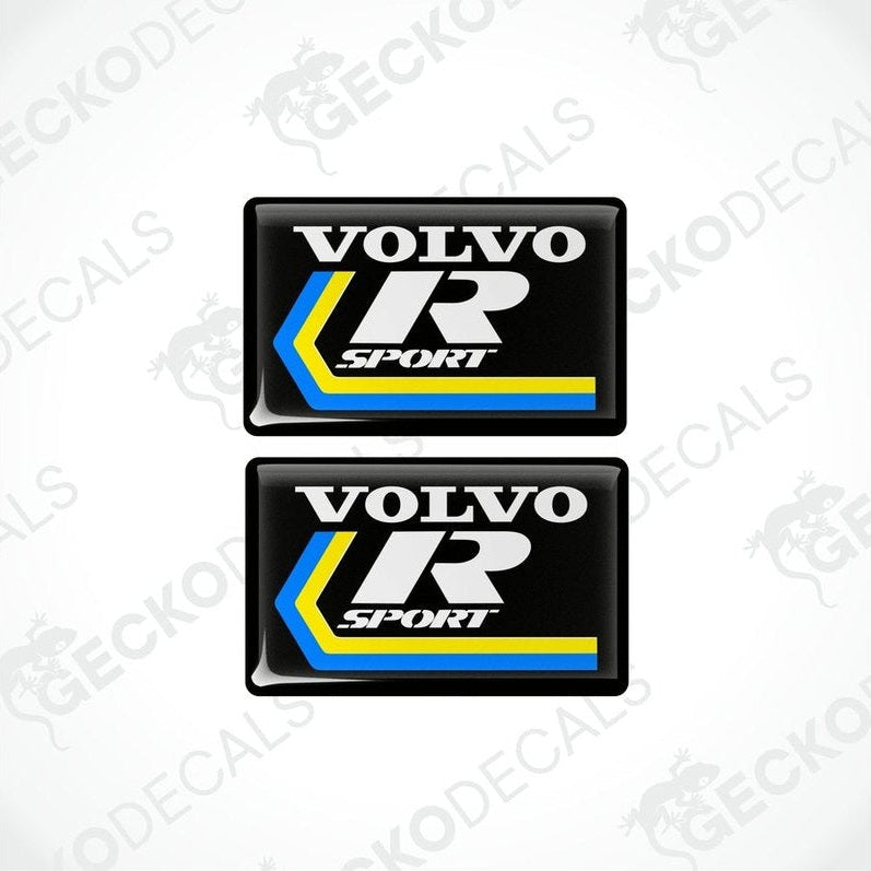 A set of two black, blue and yellow vinyl stickers with the Volvo R Sport branding.