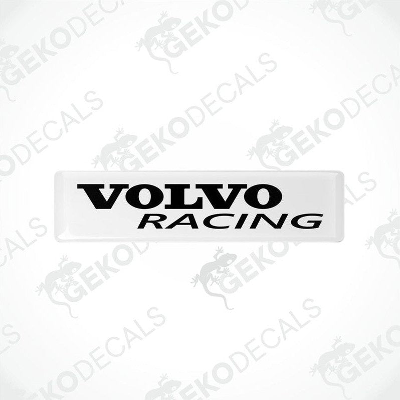 Two white vinyl stickers with the text 'VOLVO RACING' in black font, placed against a white background.