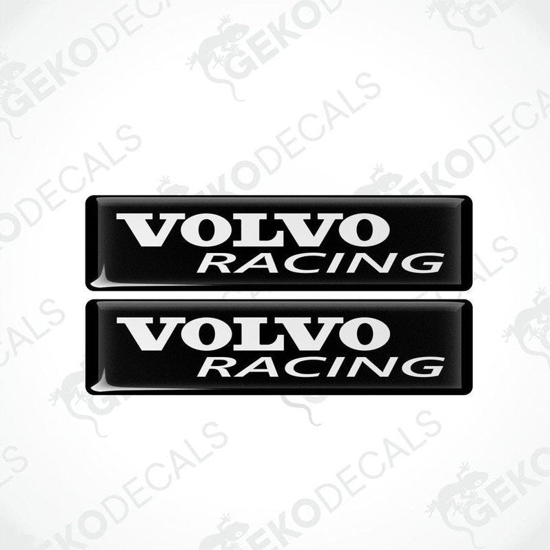 Two black vinyl stickers with the text 'VOLVO RACING' in withe font, placed against a white background.
