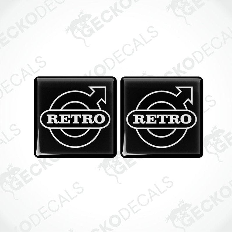 Two black vinyl stickers with the word 'RETRO' and a circular graphic symbol in white.