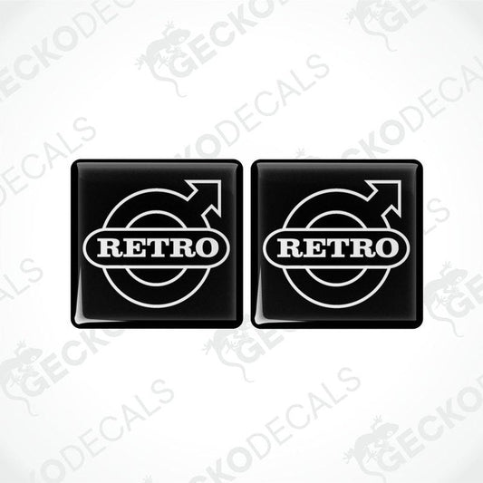 Two black vinyl stickers with the word 'RETRO' and a circular graphic symbol in white.