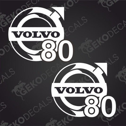 Two white square stickers with the text 'VOLVO 80' on them, presented on a dark background.