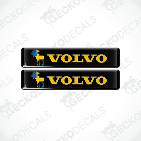 Two black vinyl stickers with the Volvo brand and a blue and yellow moose design.
