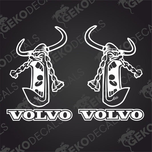 Two white stickers with the word 'VOLVO' and a Viking helmet design, one on each side, on a black background.