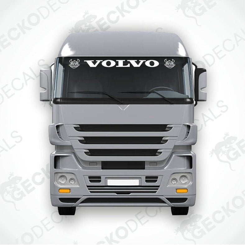 A front view of a Volvo truck with a die cut sticker on the windscreen.