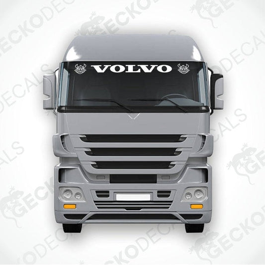 A front view of a Volvo truck with a die cut sticker on the windscreen.