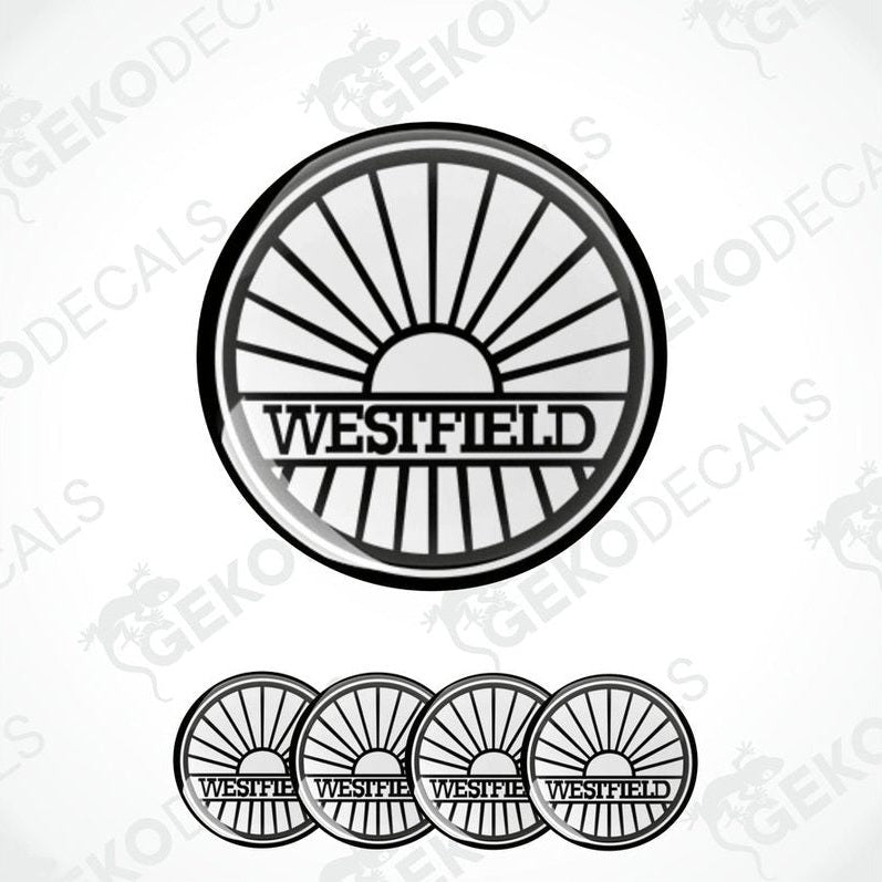 A set of four black and white vinyl decals with the word 'WESTFIELD' written in capital letters, arranged in a circular pattern with sunray extensions coming from the top edge.