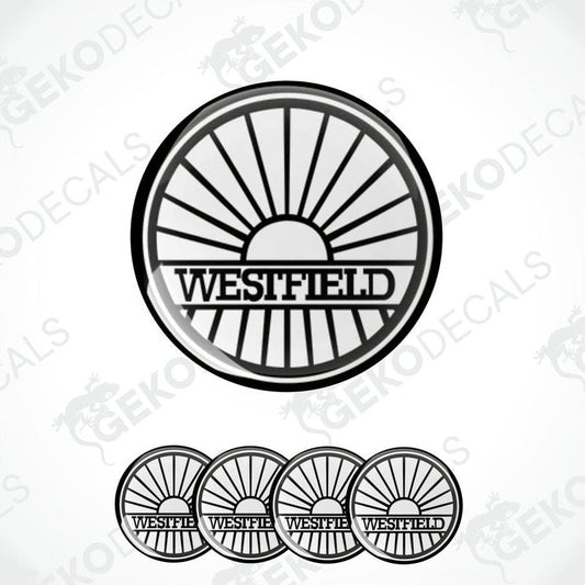 A set of four black and white vinyl decals with the word 'WESTFIELD' written in capital letters, arranged in a circular pattern with sunray extensions coming from the top edge.